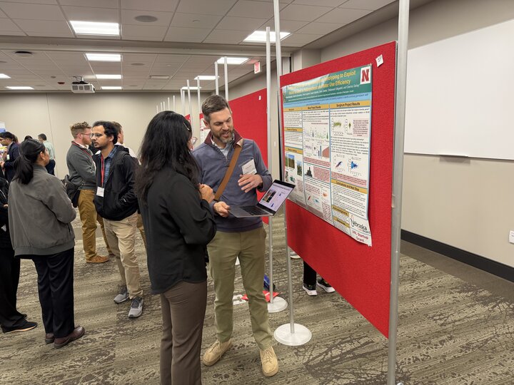 A serious discussion between Trisha and a great speaker in a conference